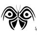 Tribal butterfly with large eyes on wings..