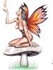 Nude fairy sat on a toadstool