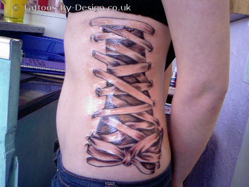 Speaking of the ribbons look, I love this tattoo.