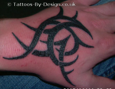Tattoos Utah on Tribal Hand Tattoos Designs