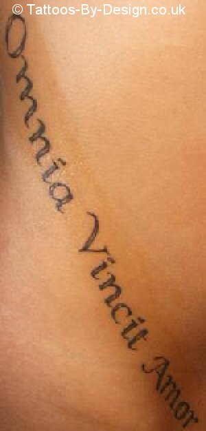 Latin phrase Tattoo