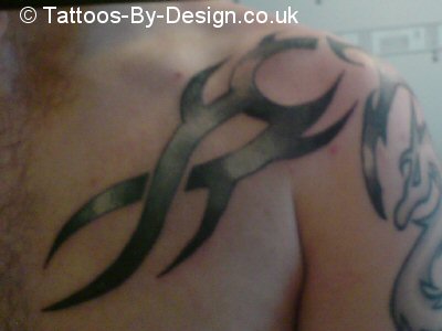 Tribal tattoo on Chest