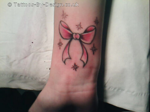 Wrist tattoo. Submitted by staci. I have a bow on the inside of my left 