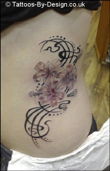 rib tattoo designs. rib tattoo designs.