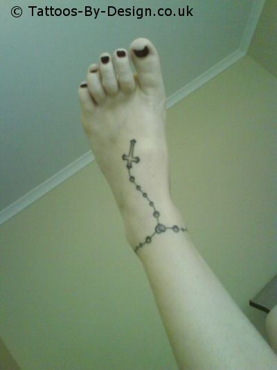 Rosary Tattoo On The Foot. nicole richie rosary tattoo