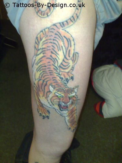 tiger on thigh Tattoo