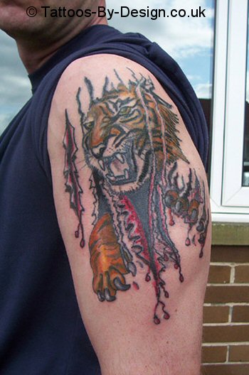 Tiger Ripping Skin Tattoo