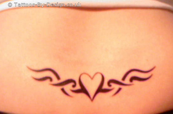 Female With Tribal Tattoos Specially Lower Back Heart Tribal Tattoo Designs